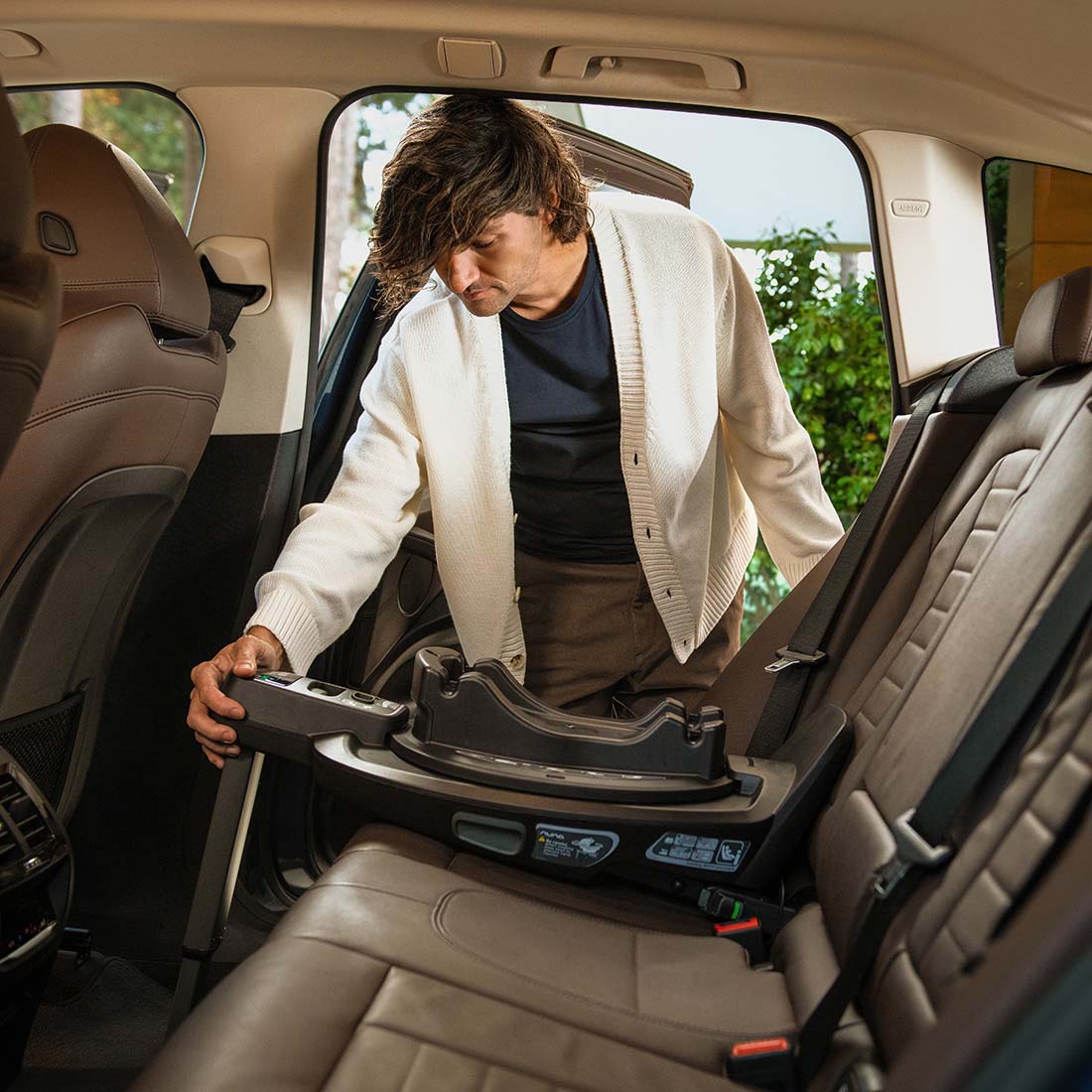 Nuna BASE™ curv – Base auto ISOFIX con rotazione intelligente per viaggi più semplici e sicuri